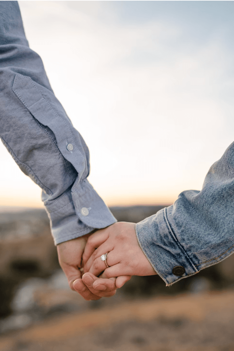 A couple holding hands