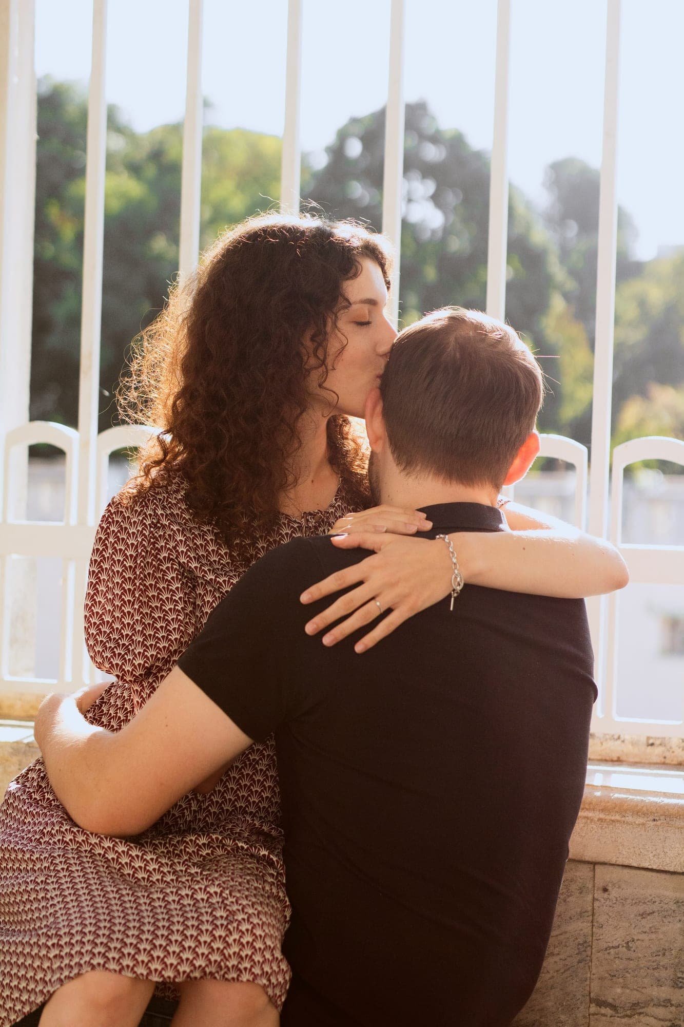 A couple in a tender, intimate embrace